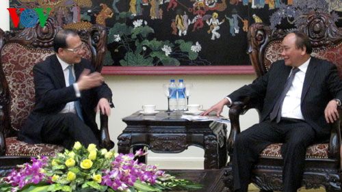 ທ່ານຮອງນາຍົກລັດຖະມົນຕີ ຫງວຽນຊວນຟຸກ ຕ້ອນຮັບປະທານກຸ່ມບໍລິສັດ Sunwah